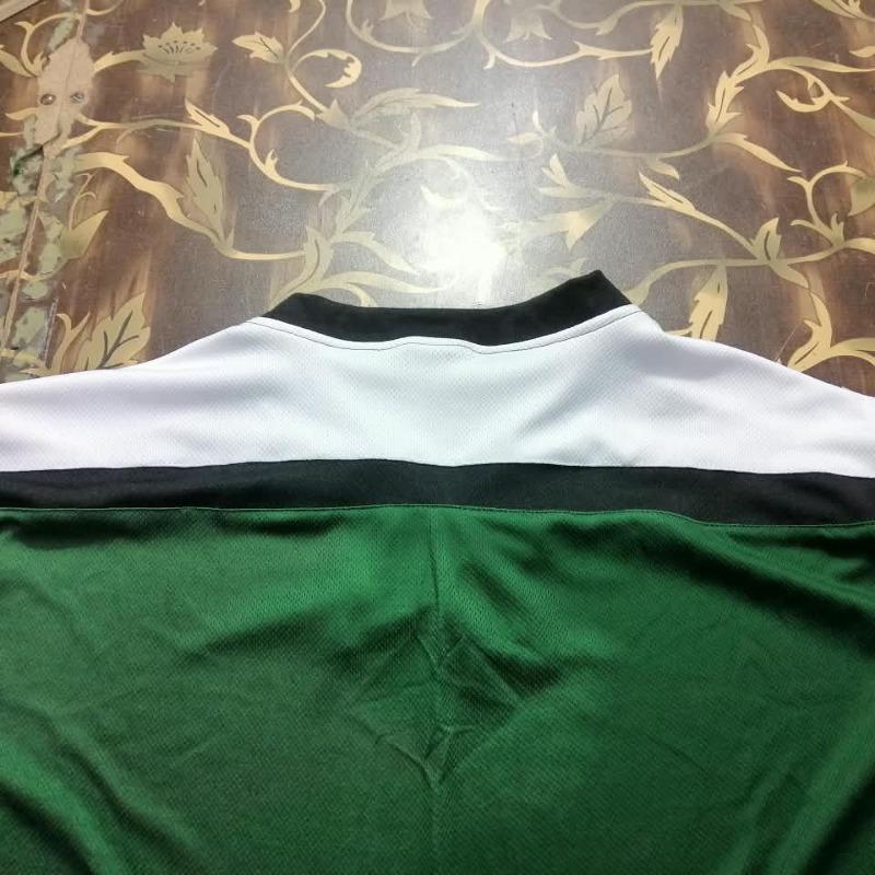 Professional Green, Black, and White Athletic Hockey Jersey